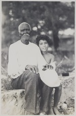 Bejaarde man met kind op Curaçao